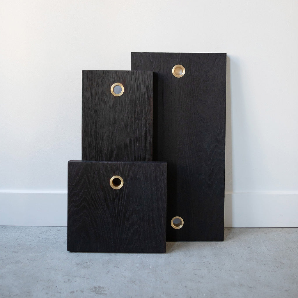 Charred Oak solid wood serving boards with brass ring. Handmade in Vancouver BC by Brett Yarish