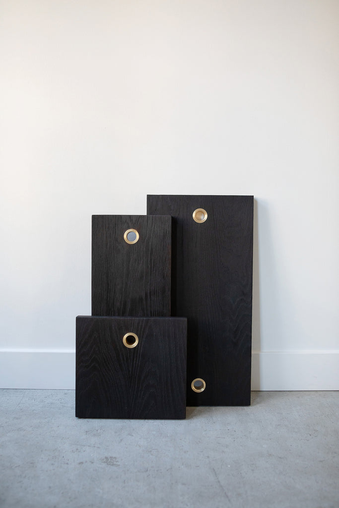 Charred Oak Solid wood serving boards with brass ring. Handmade in Vancouver BC by Brett Yarish