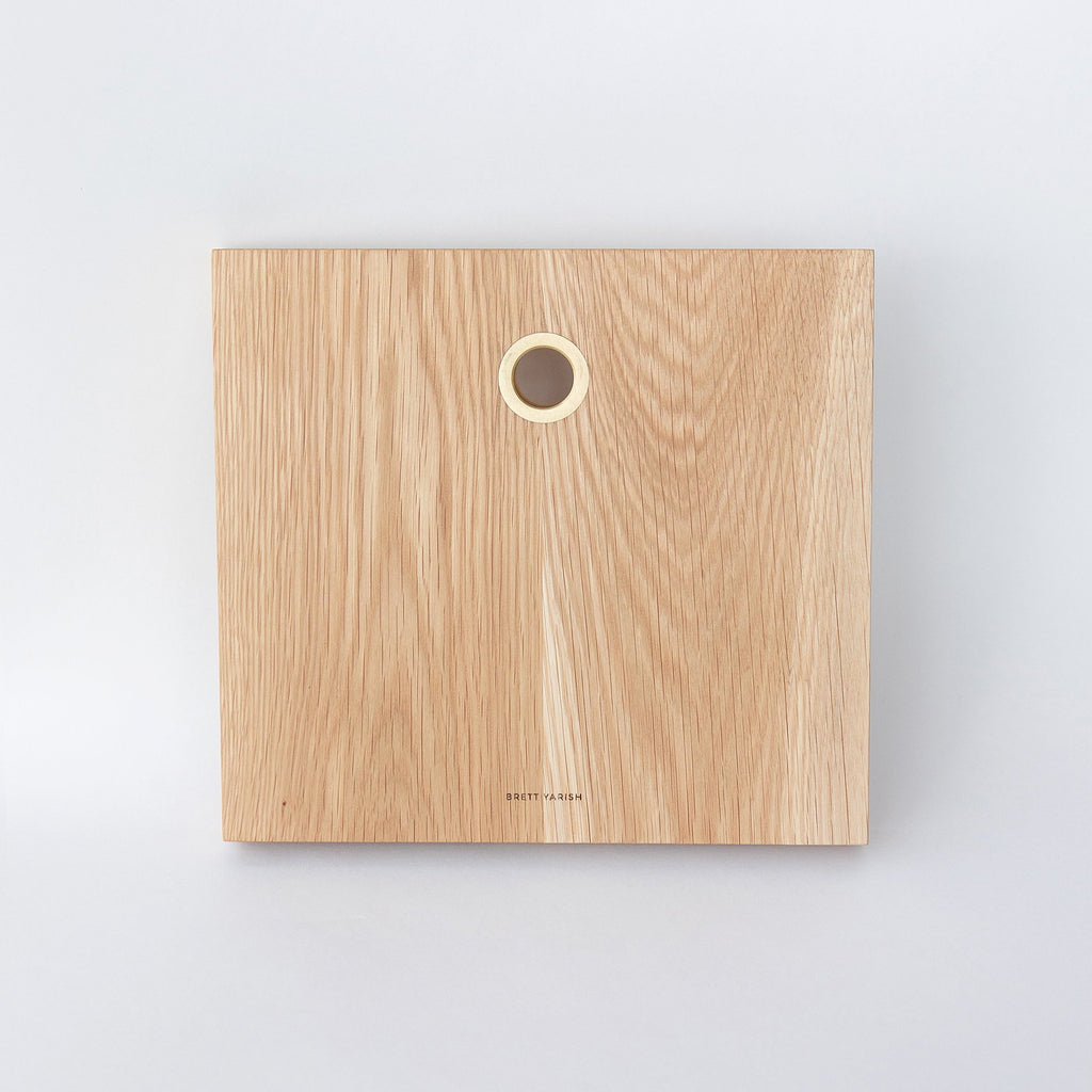 White Oak solid wood serving boards with brass ring. Handmade in Vancouver BC by Brett Yarish